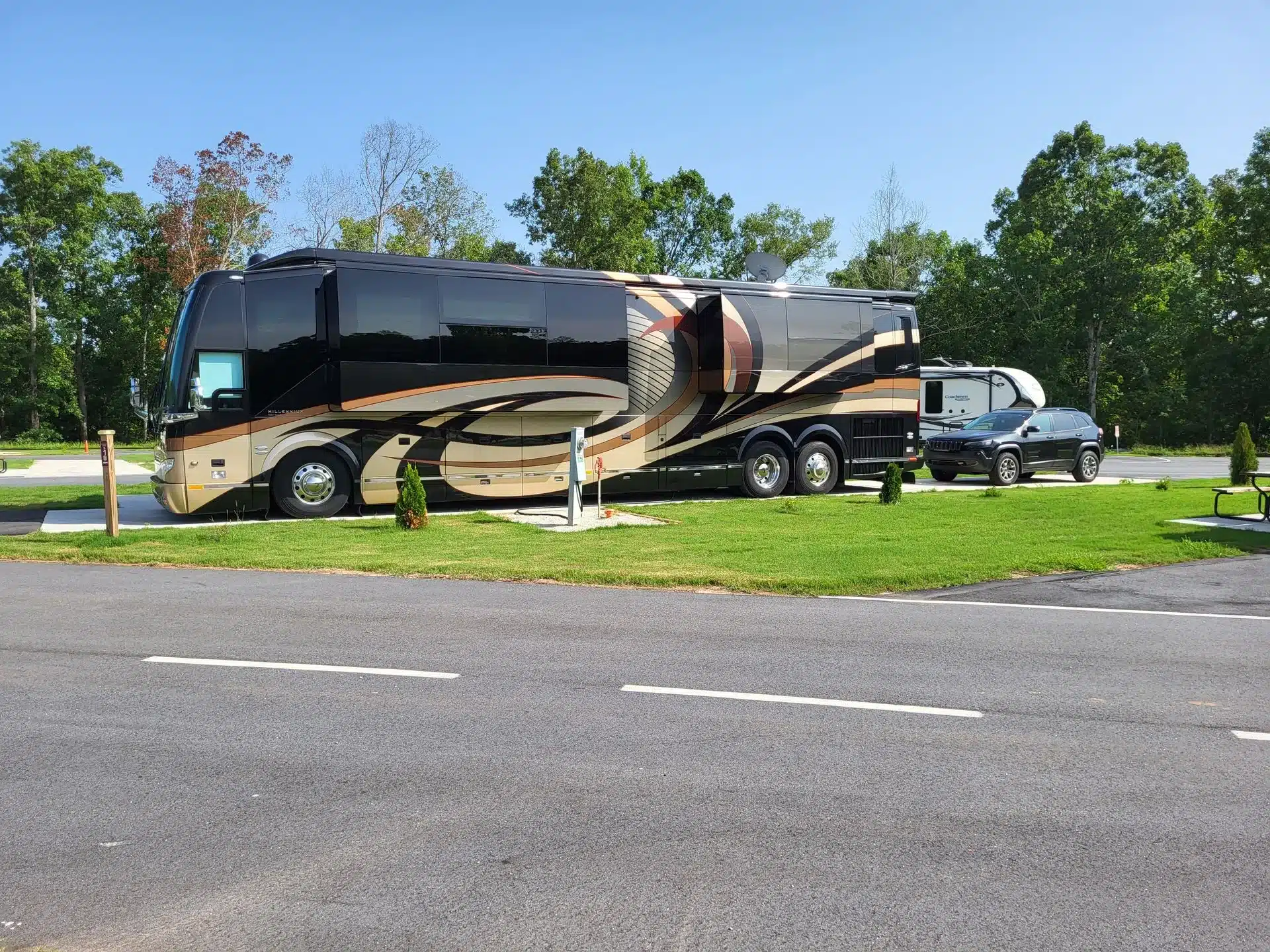 Motorhome parked on a landscaped site at Atlanta South RV Resort