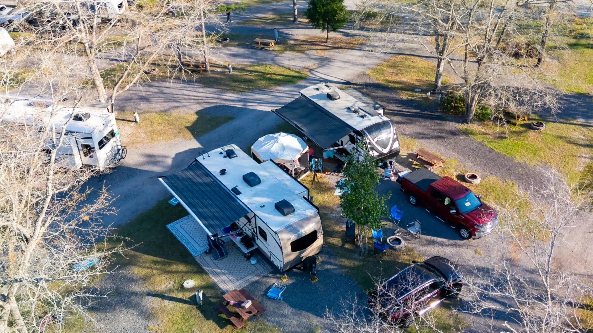 Wooded RV sites at Okefenokee Pastimes Cabins & Campground in Folkston, Georgia