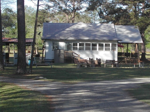 Community fire pit and gathering area at Americus KOA Journey
