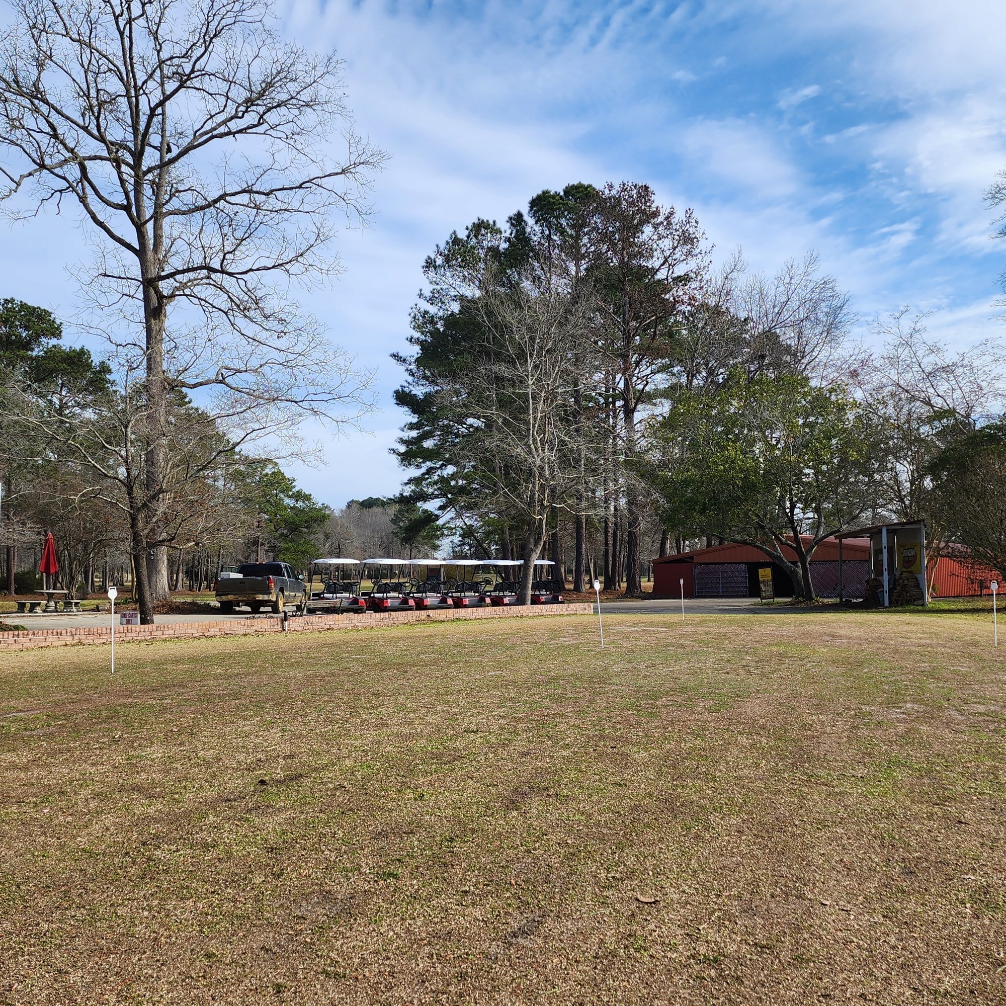 Putting green and golf-cart area at Americus KOA Journey