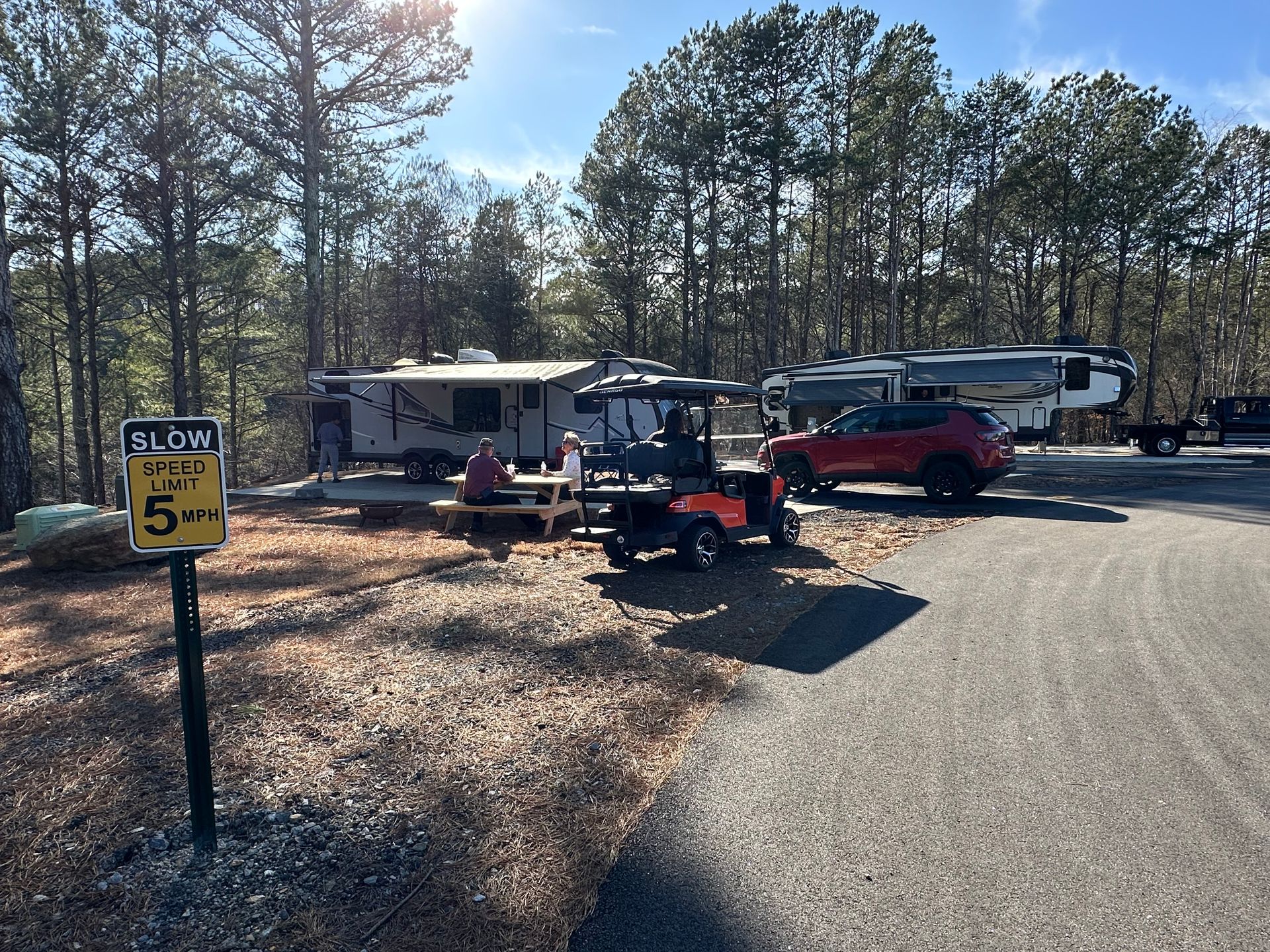 RV campsite with a picnic table at Apple Country RV Resort