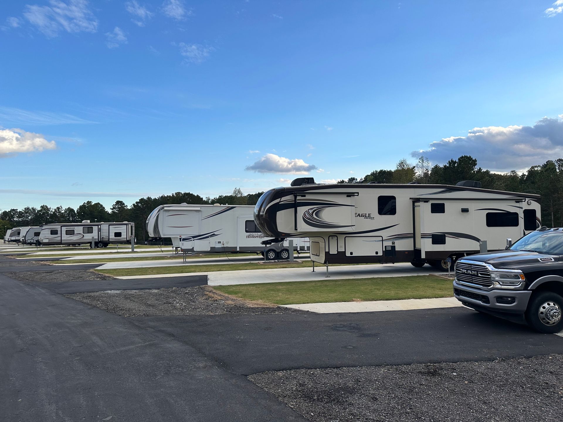 RVs parked on concrete pads at Apple Country RV Resort
