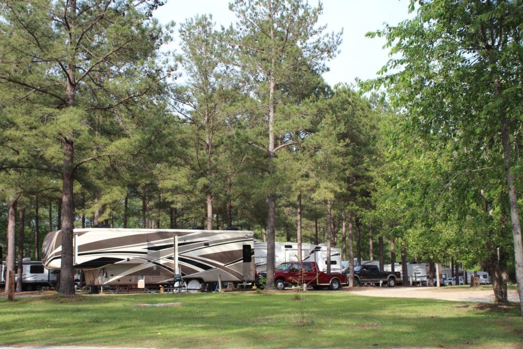 RV sites surrounded by trees at Beaver Run RV Park