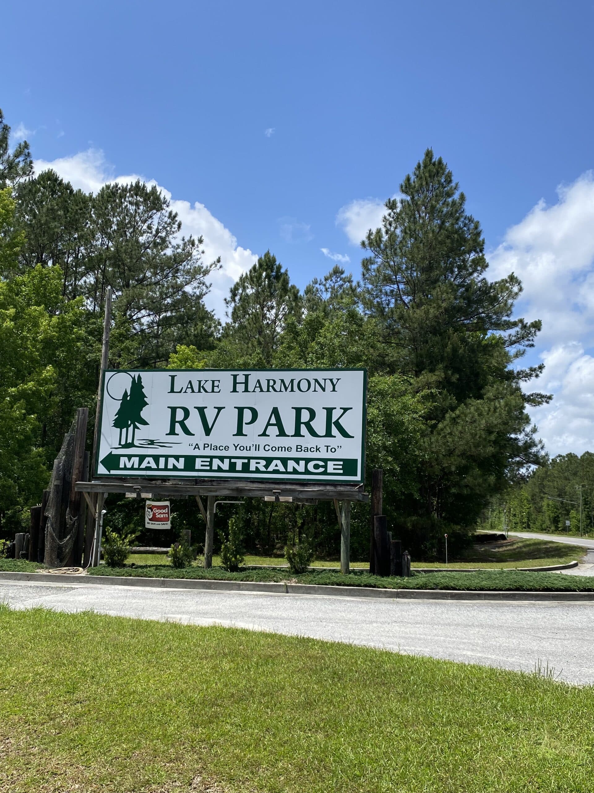 Entrance sign at Lake Harmony RV Park in Townsend, Georgia
