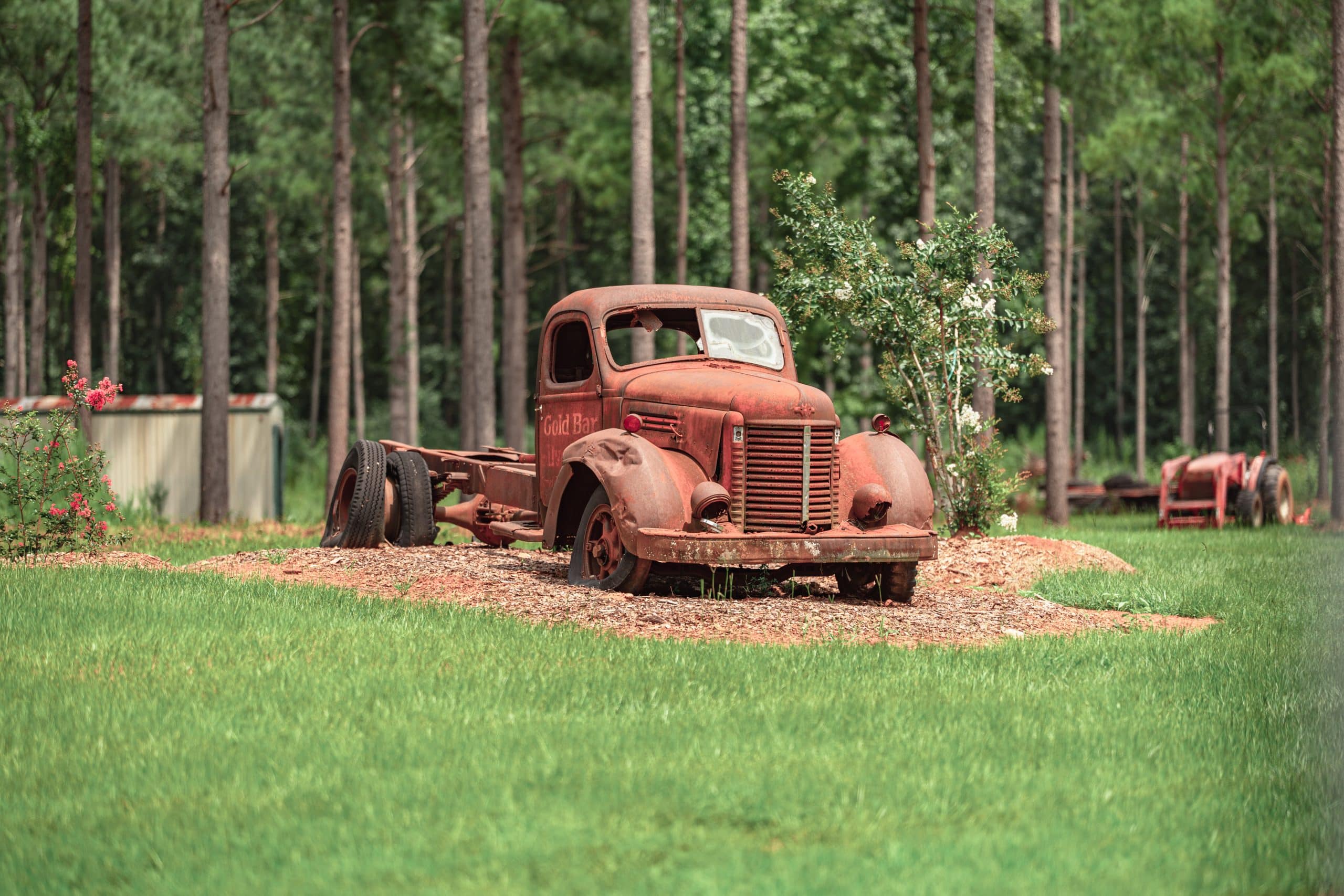 Vintage truck displayed on the grounds of Little River RV Park at Durhamtown