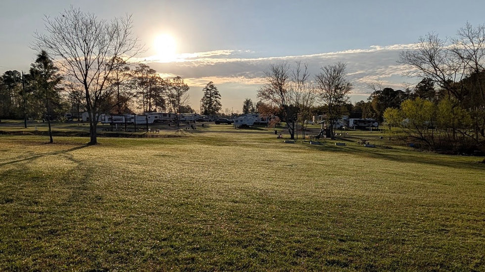 Open RV camping area at Pebble Hill RV Park