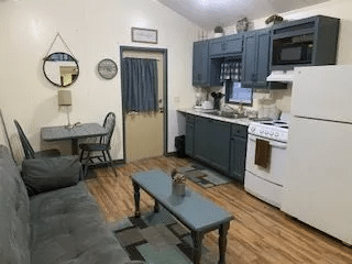 Tiny cabin living area and kitchen at River Falls at the Gorge
