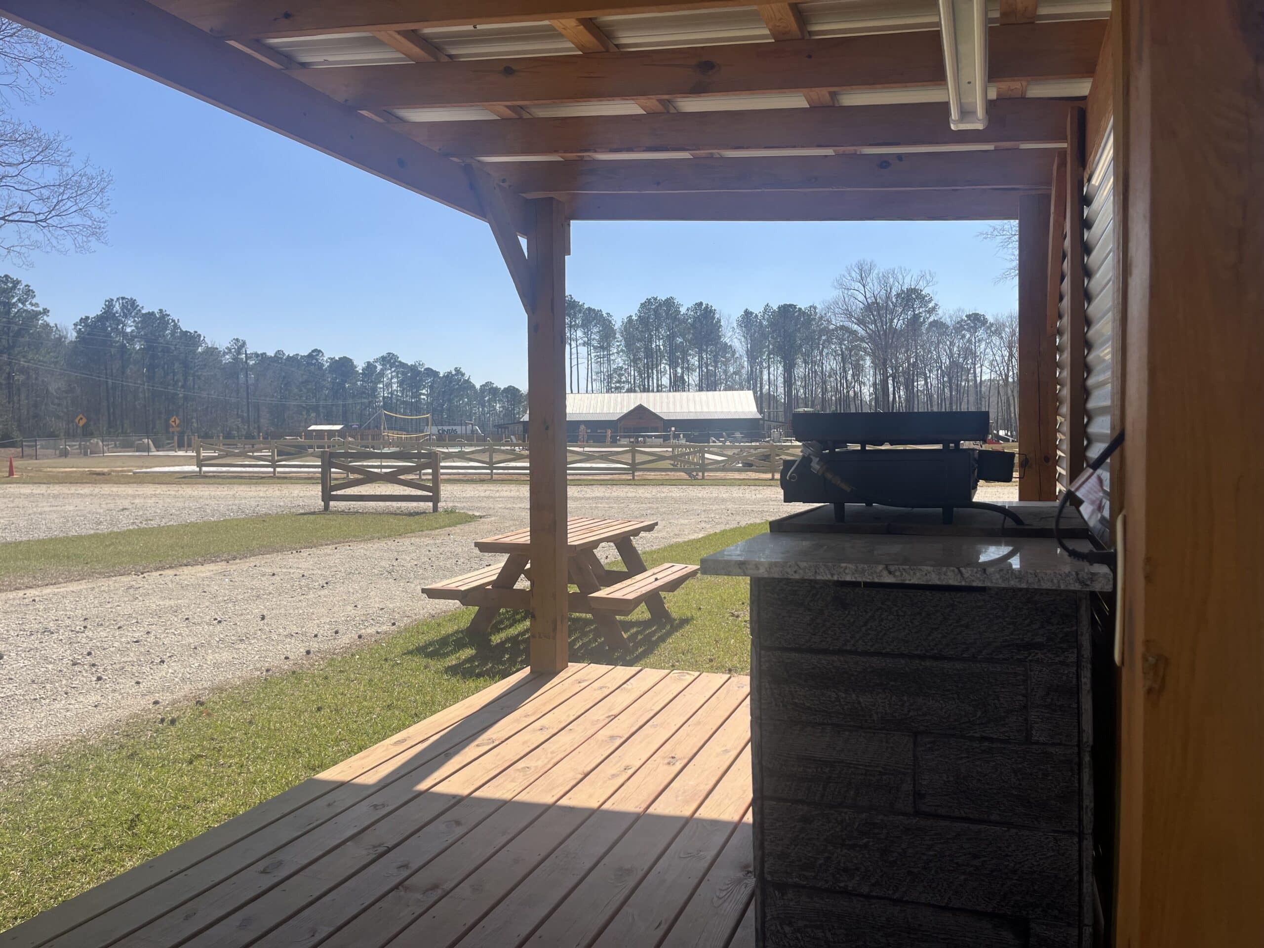 Premium RV site with an outdoor kitchen at Sanwar RV Park & Resort