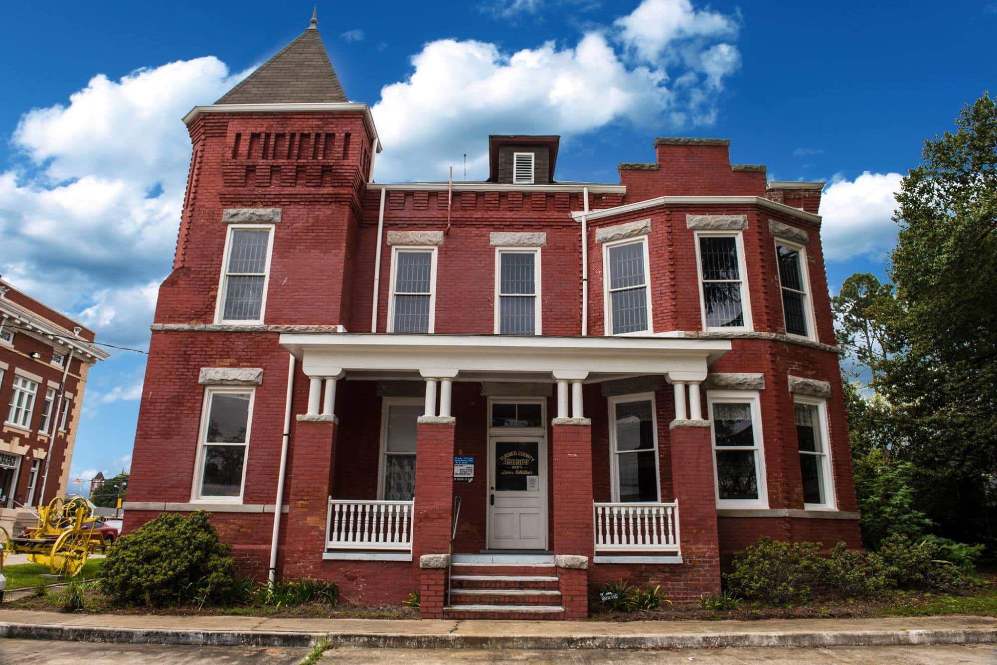 Historic building featured as the Crime and Punishment Museum in Explore Georgia's Ashburn guide
