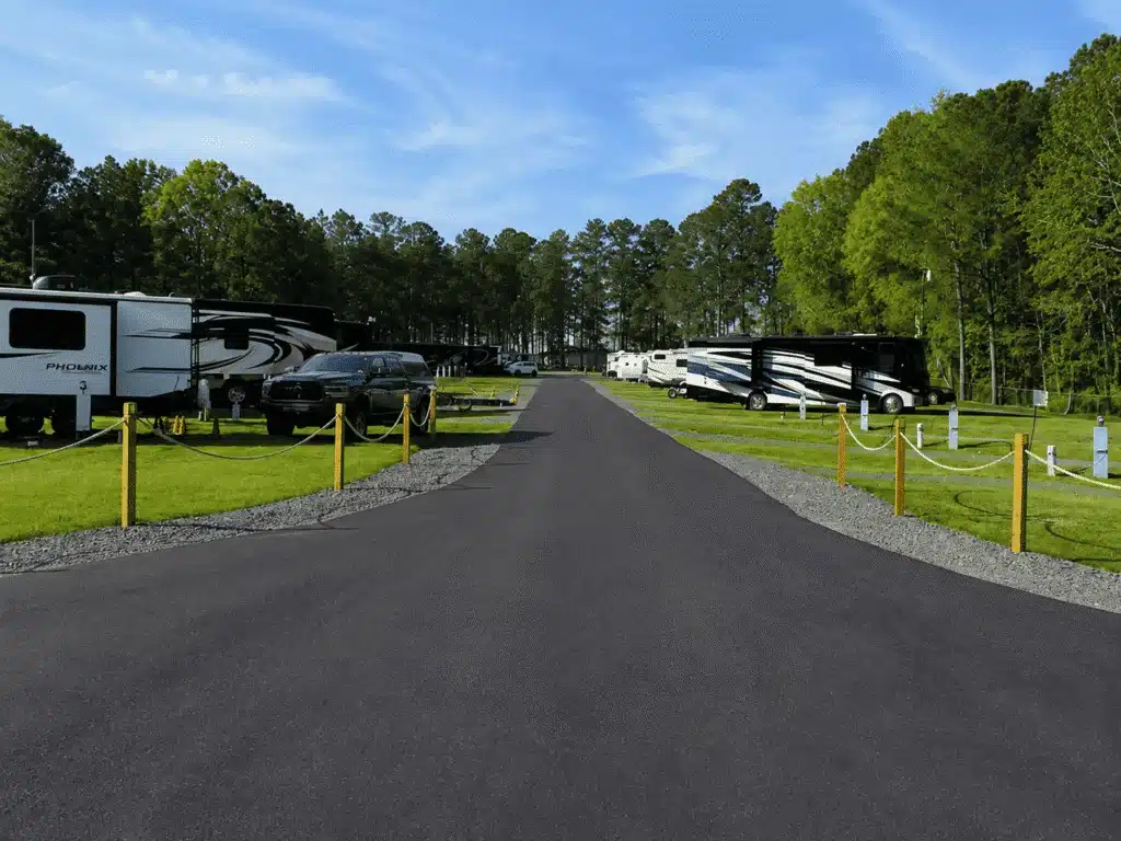 RV sites surrounded by trees at Forsyth Station RV Resort