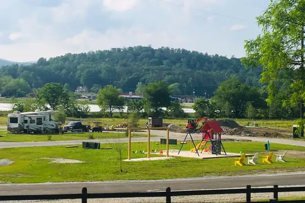 Playground and outdoor seating at Willow Valley RV Resort