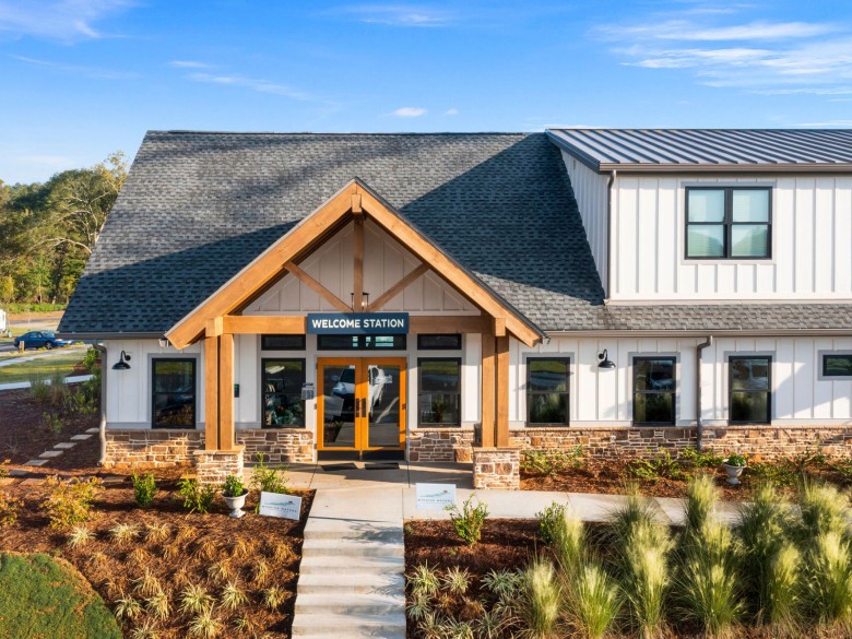 Welcome station and clubhouse building at Winding Waters Riverfront RV Resort